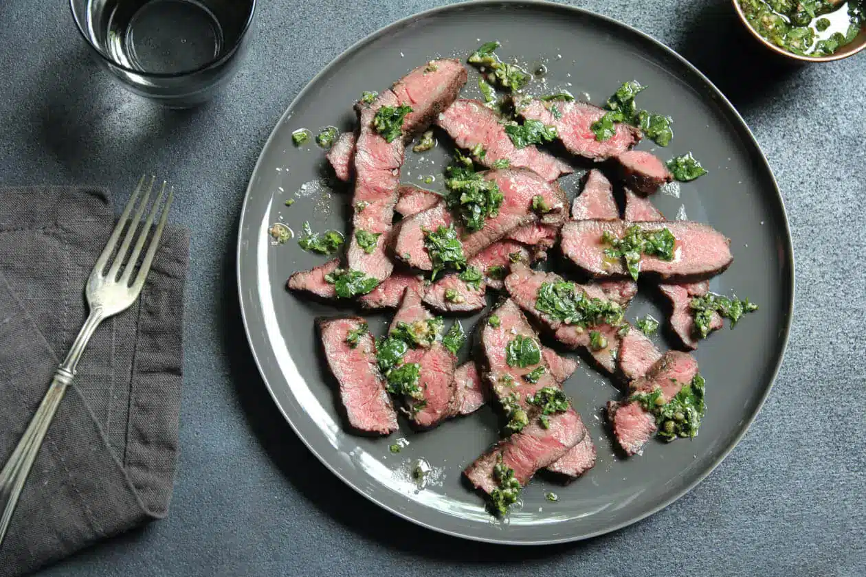 Bobby Flay Flat Iron Steak Garnished With Fresh Parsley